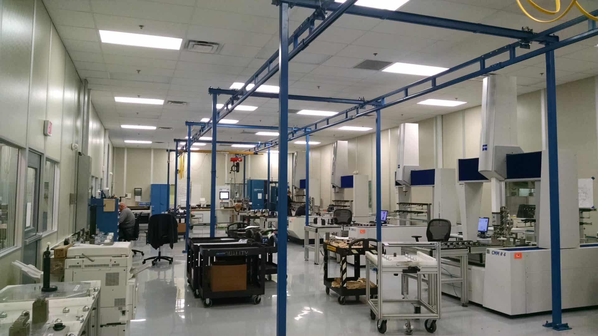 a room with blue poles and blue objects