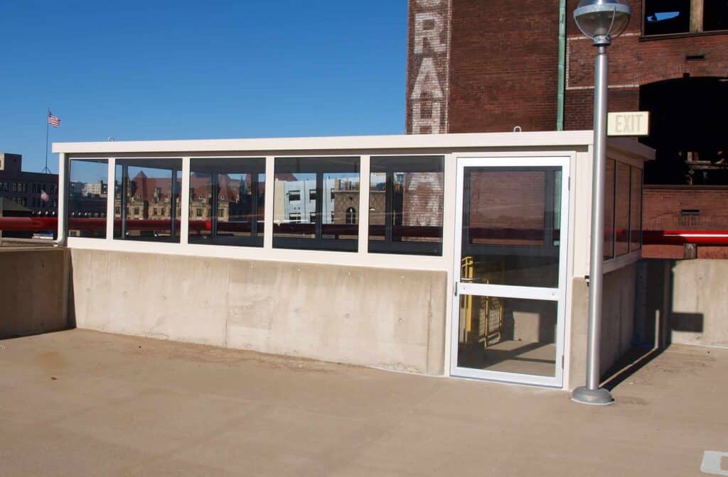 Custom stair enclosure designed to fit over existing concrete wall