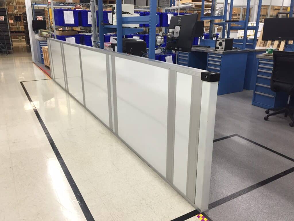 Free standing wall partition to divide space in a factory