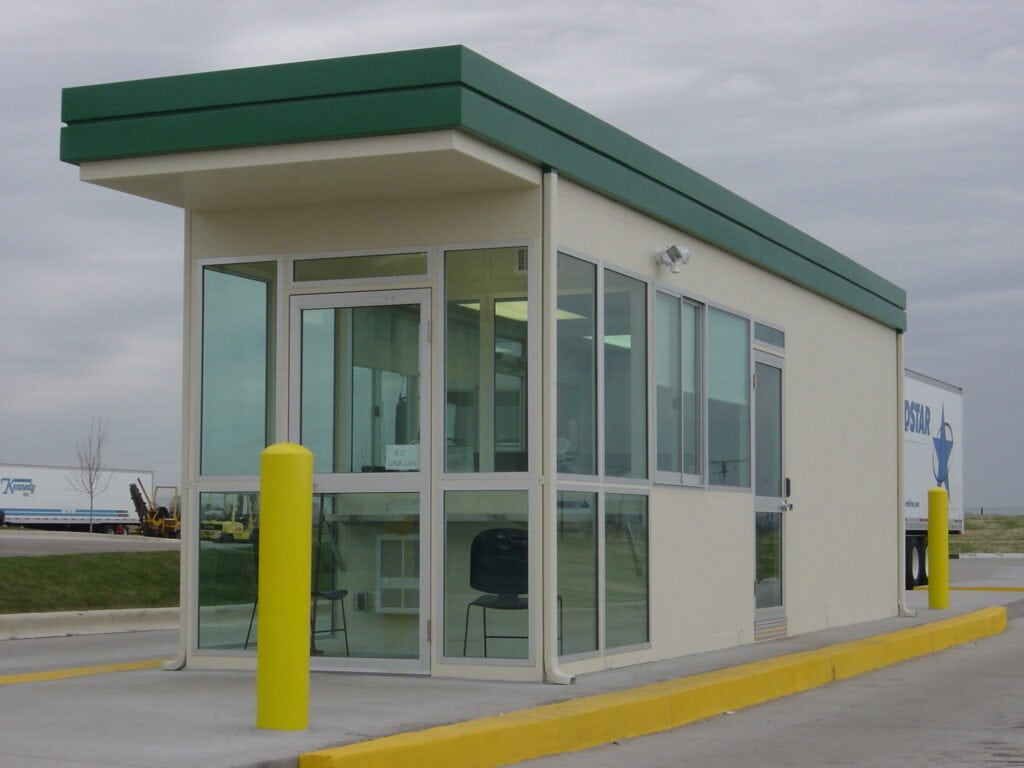 Security Building with enclosed driver receiving area and factory installed restroom