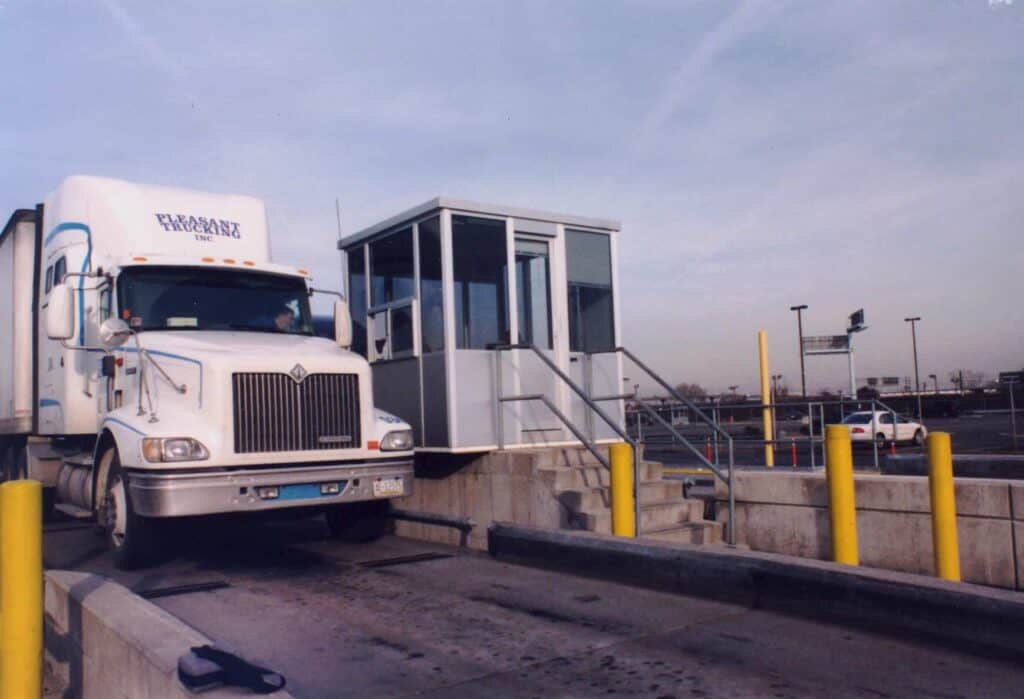 A white semi truck labeled 