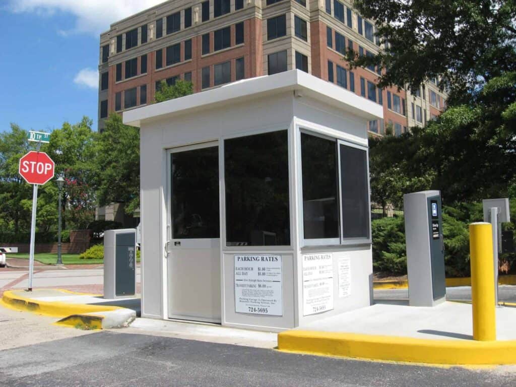 A parking solutions booth with large windows, featuring a 