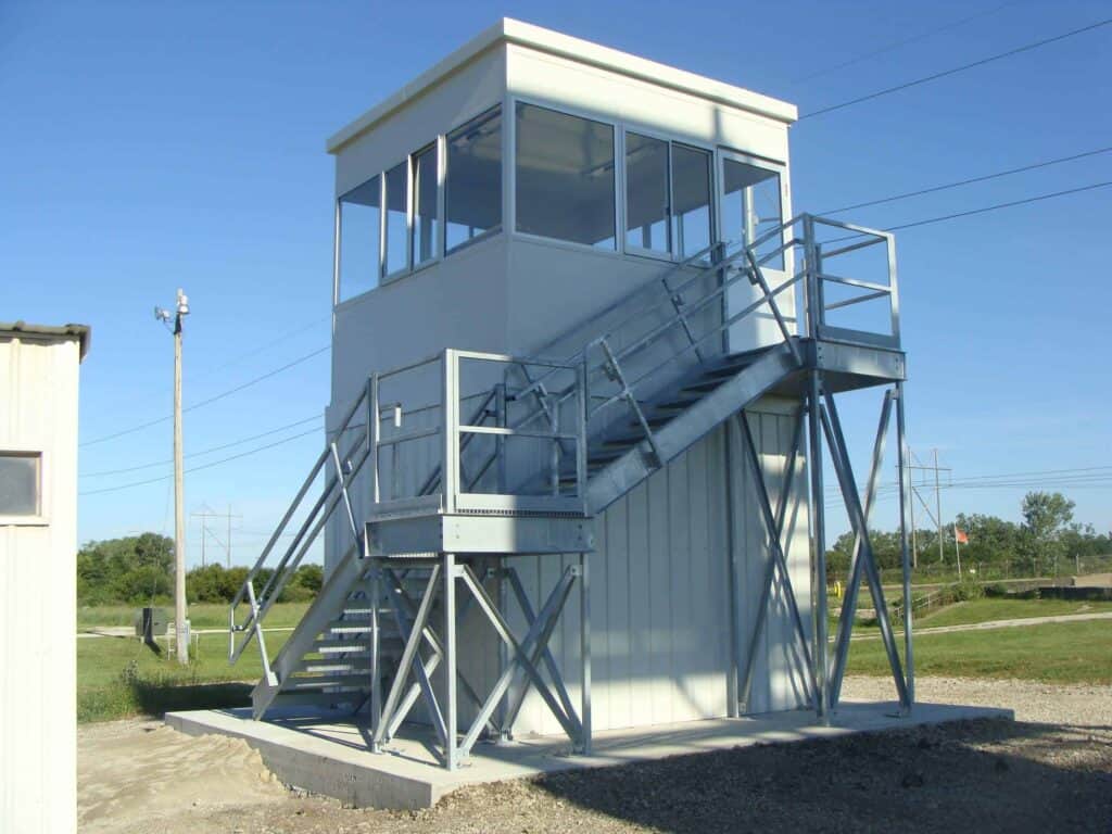 a white range tower built by Porta-King