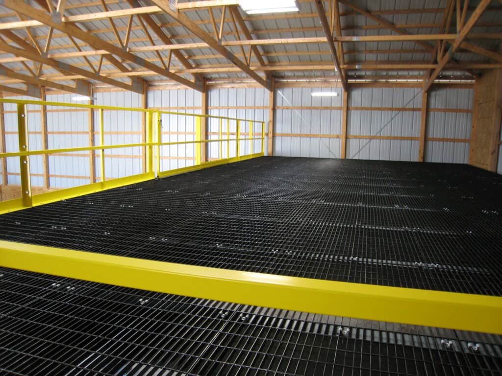 Storage platform mezzanine with bar grate decking