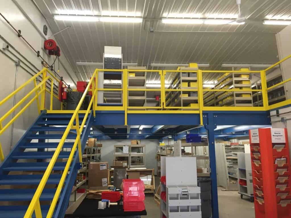 Storage platform mezzanine painted blue with swing gate