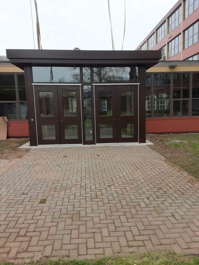 Entry vestibule with entry and exit double doors