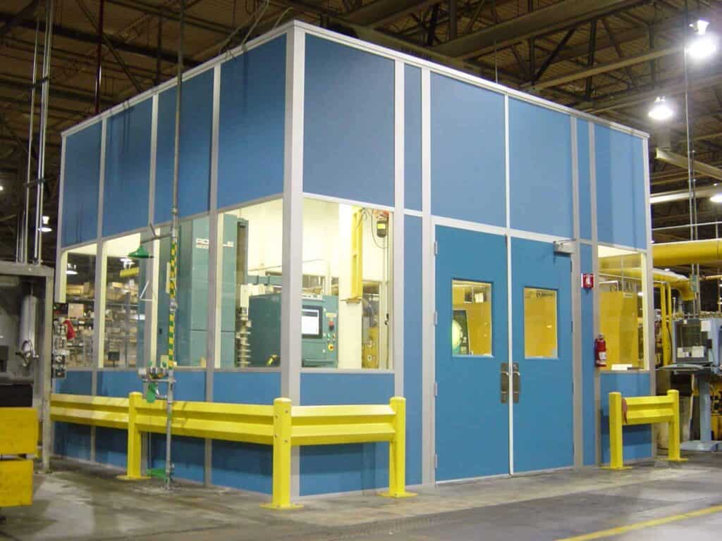A Modular CMM Room in Blue with Large Windows and Equipment Inside