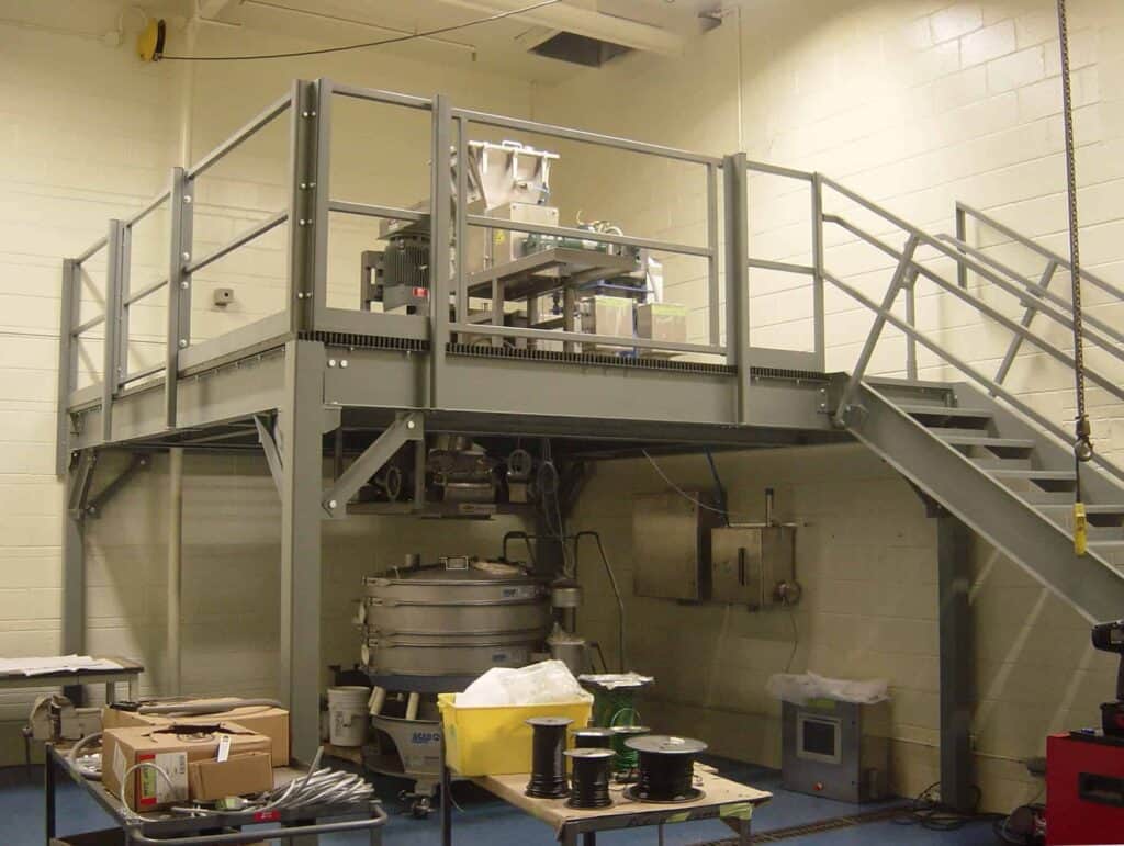 Equipment platform with lift out gate built by Porta-King