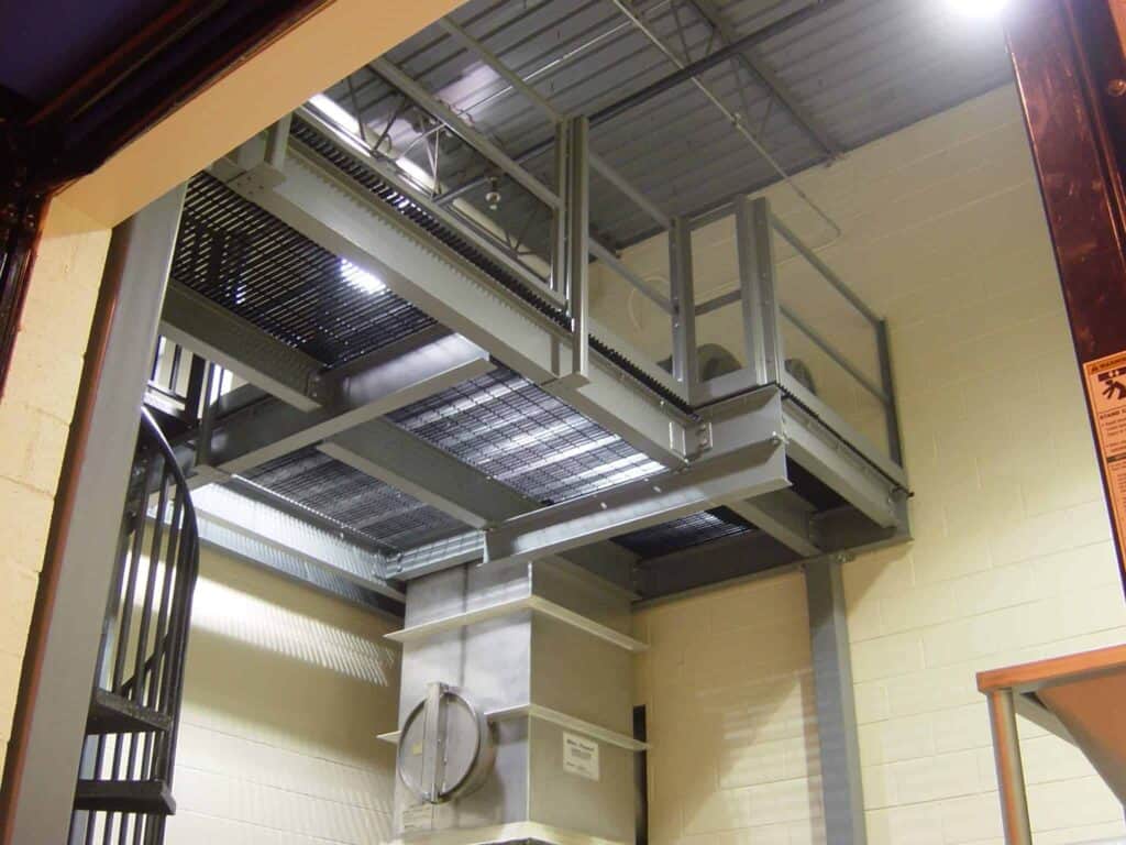 Equipment platform with bar grate deck built by Porta-King