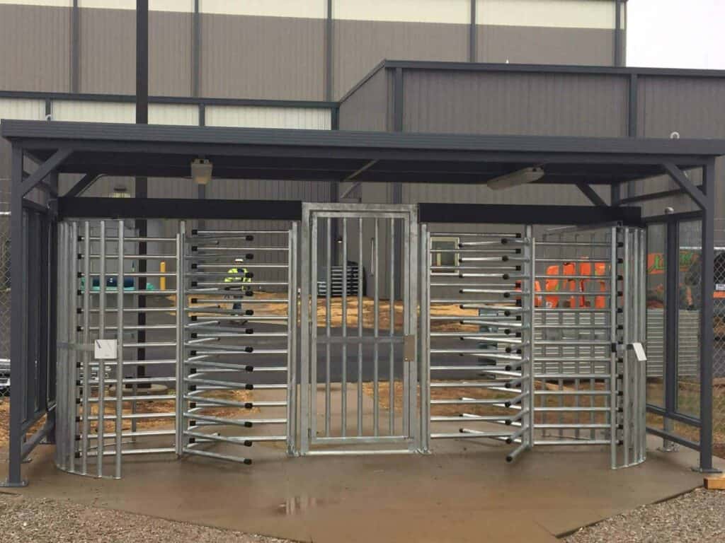 a prefabricated turnstile shelter built by Porta-King