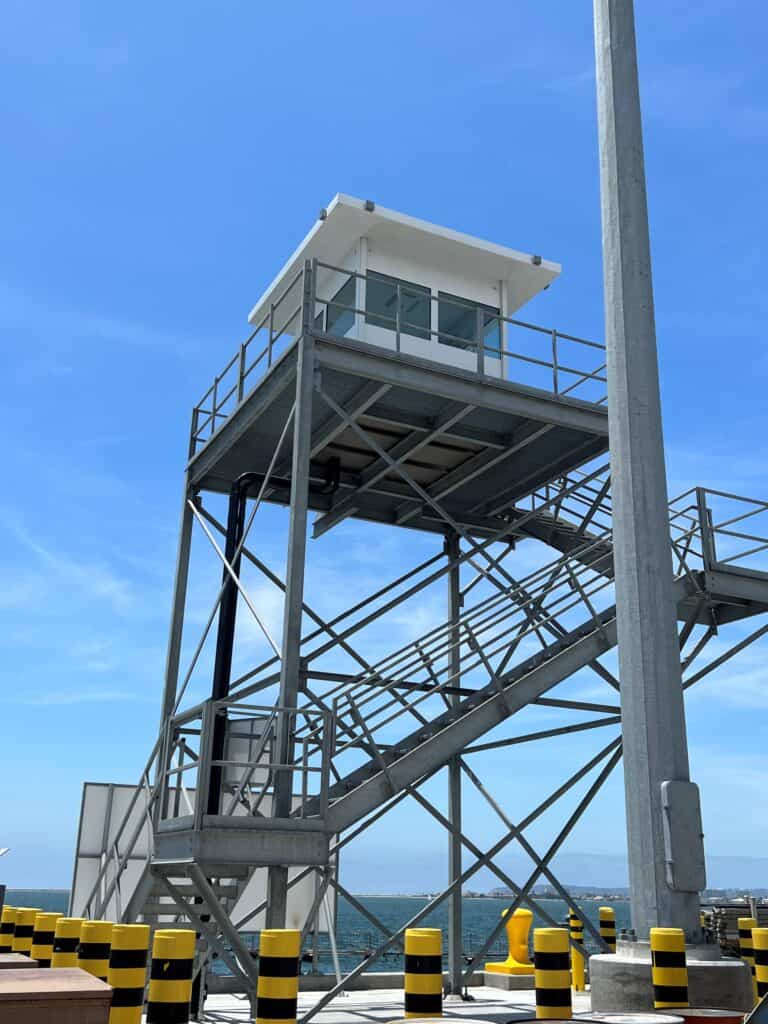 A UL Level 3 on top of a 25’ galvanized steel tower located on a Navy pier.